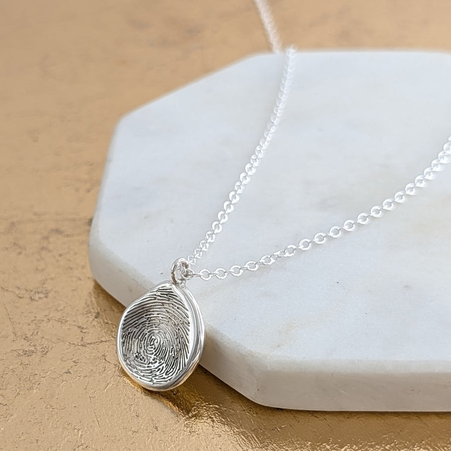 Fingerprint Jewellery - in silver and gold.