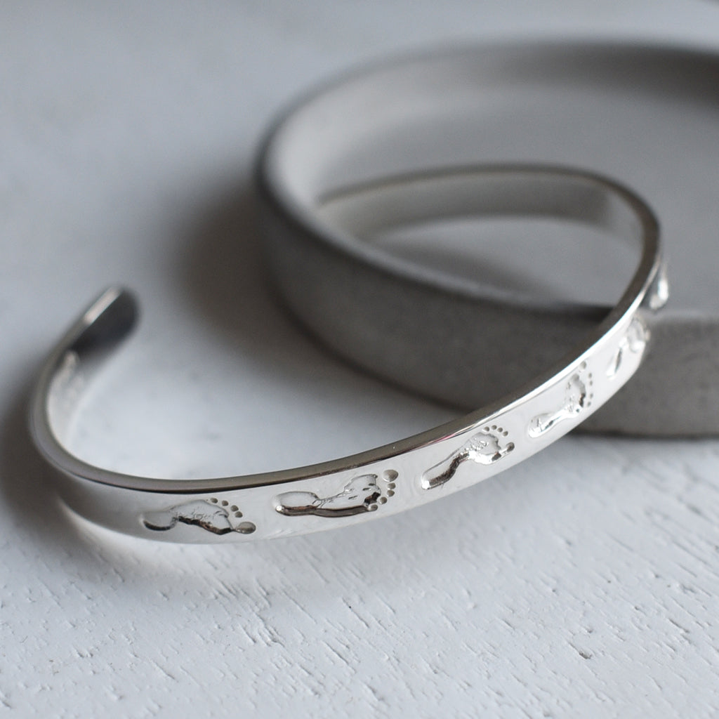 silver footprint cuff bracelet