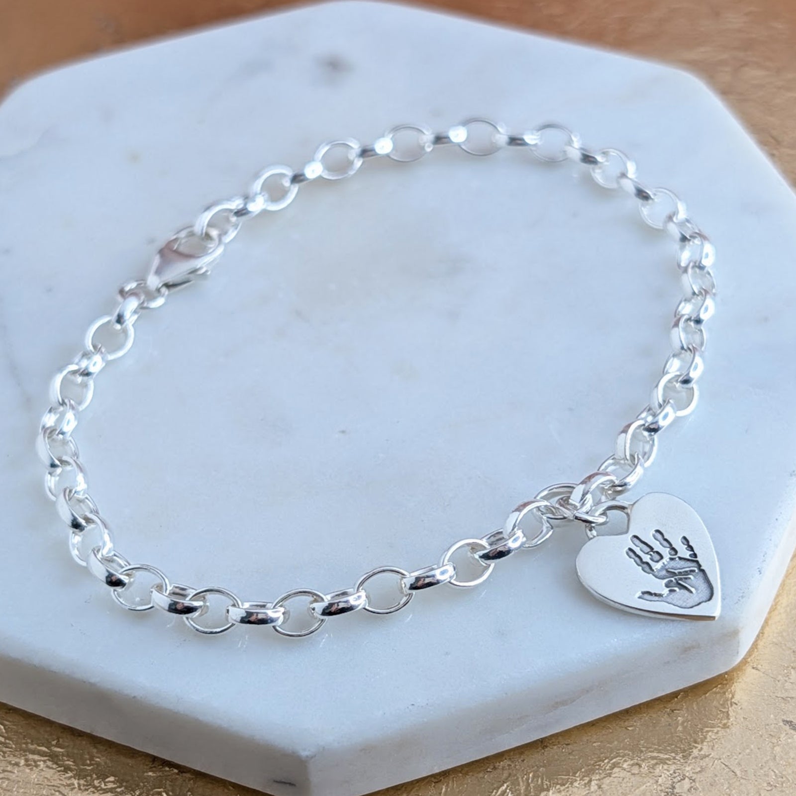 Baby handprint and footprint silver charm bracelet - personalised with your baby's handprints
