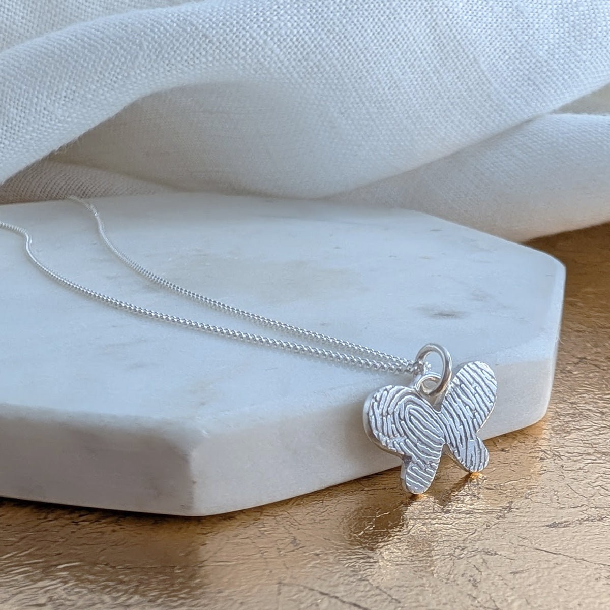DAINTY BUTTERFLY FINGERPRINT CHARM