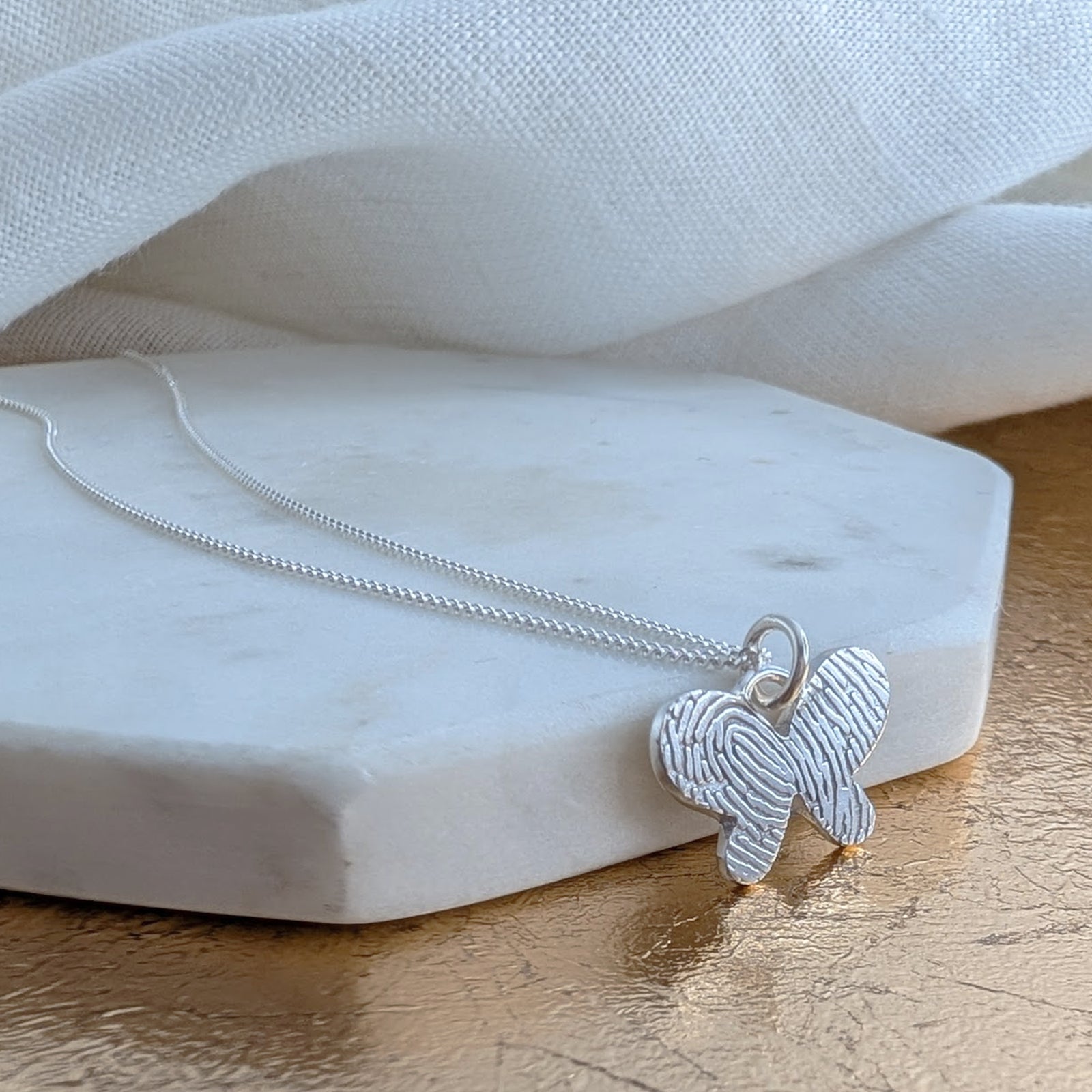 DAINTY BUTTERFLY FINGERPRINT CHARM