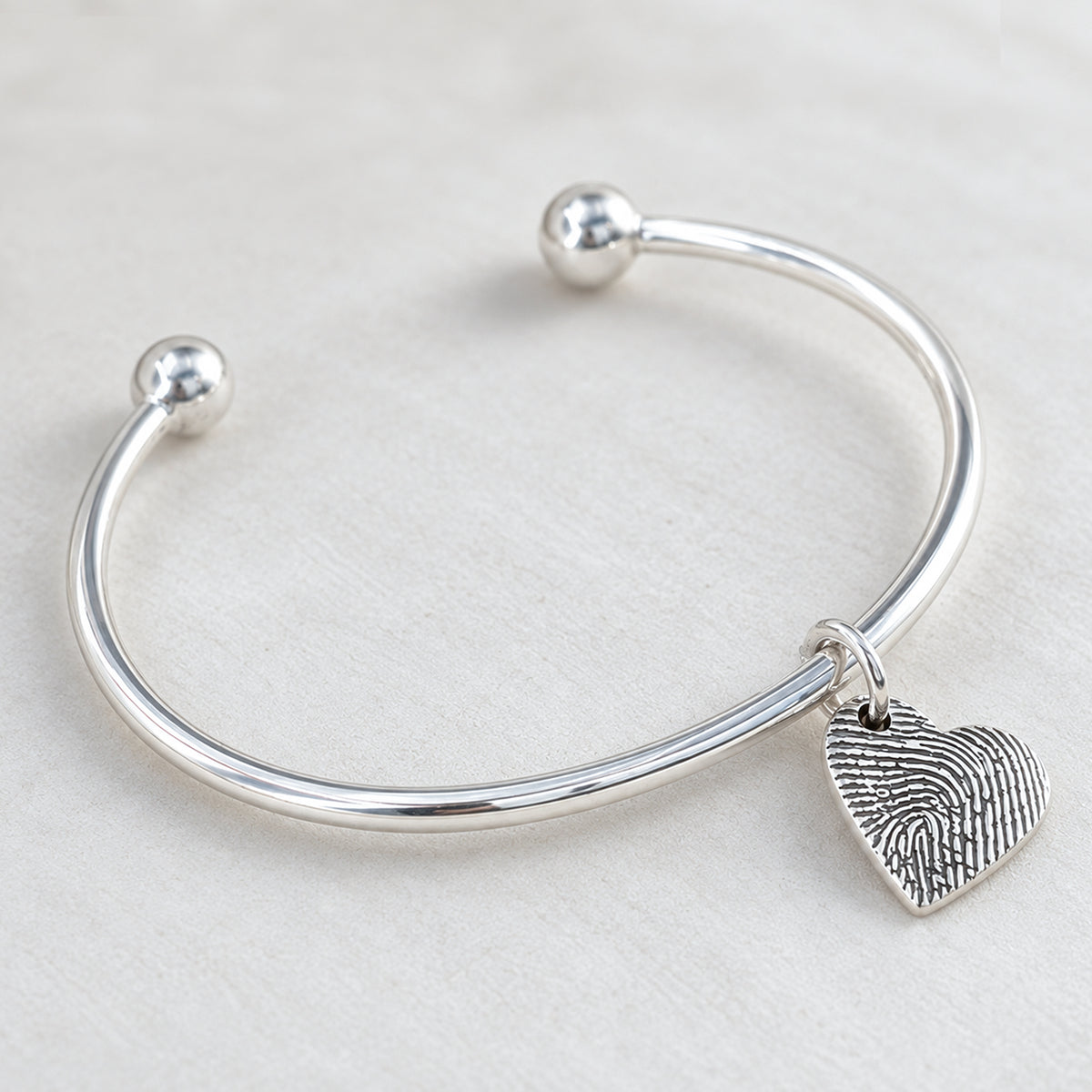 Silver FIngerprint Charm Torque Bangle