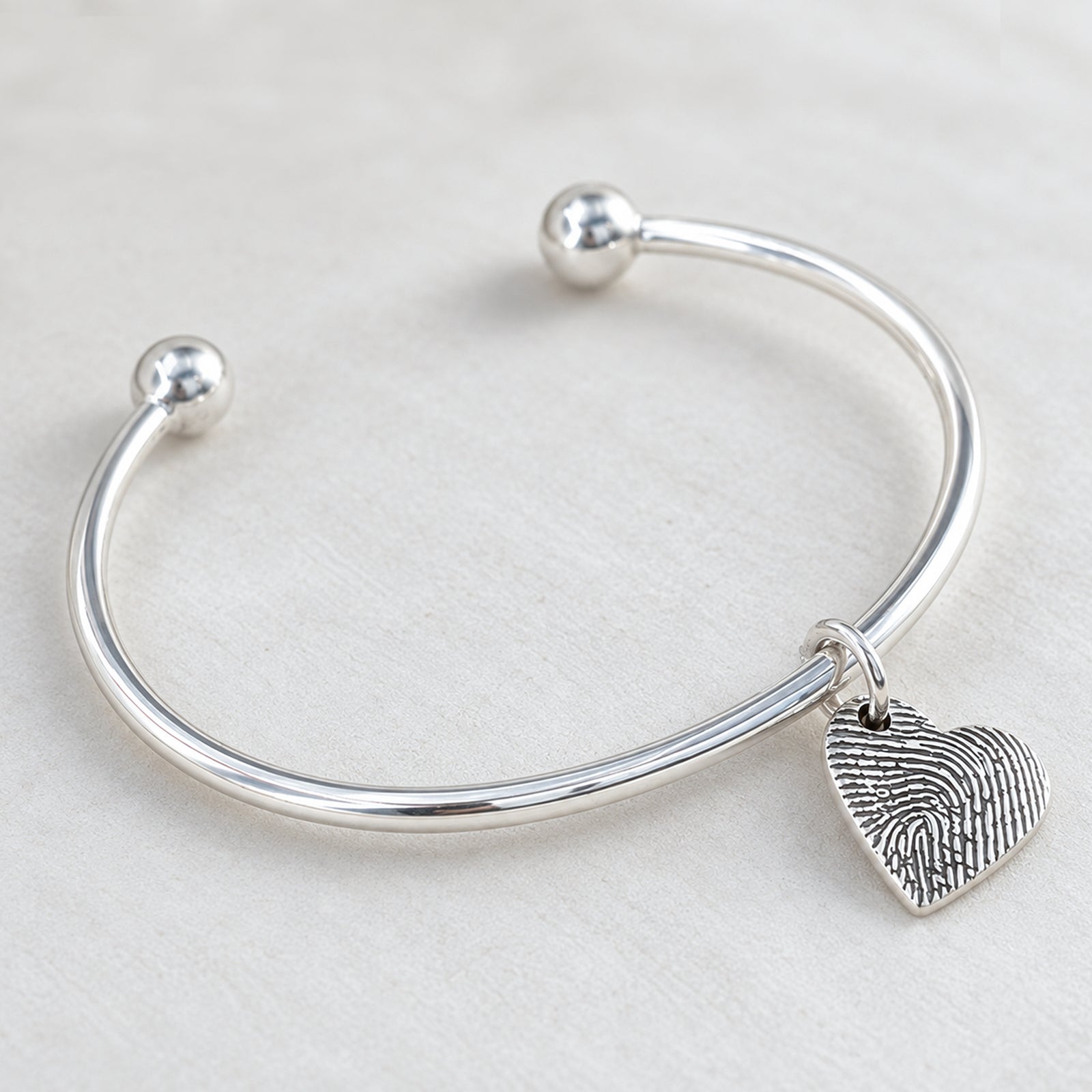 Silver FIngerprint Charm Torque Bangle
