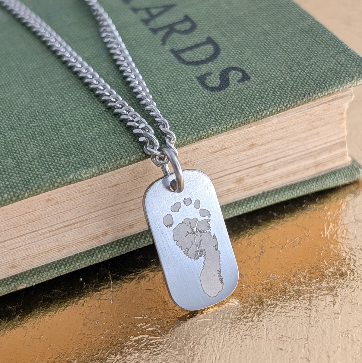 FOOTPRINT STEEL SMALL DOG TAG NECKLACE