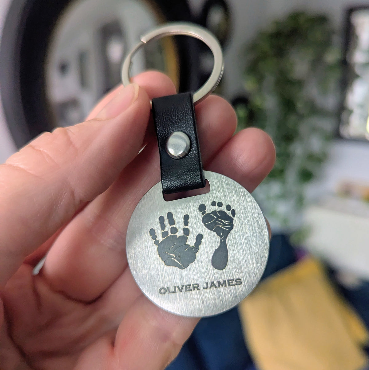 HAND &amp; FOOTPRINT STEEL DISC KEYRING