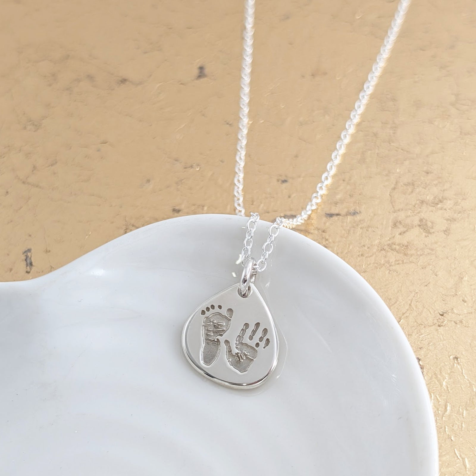 Silver handprint and footprint necklace - engraved with childs prints