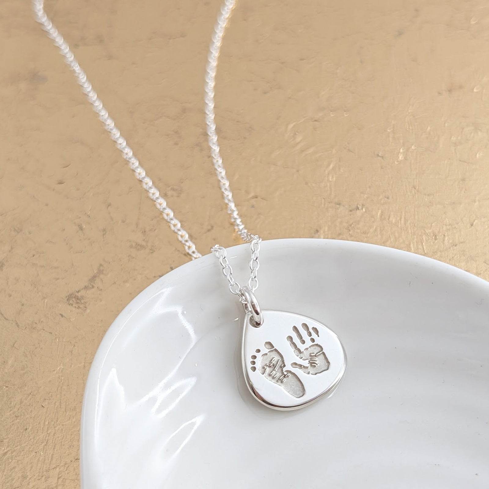 Silver handprint and footprint necklace - engraved with childs prints