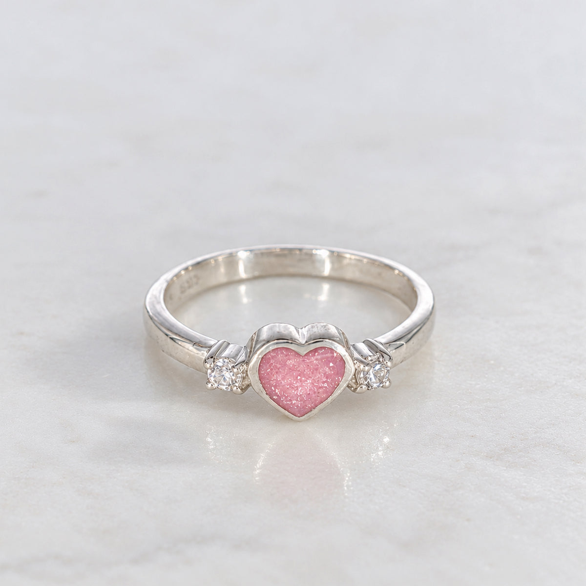 Sterling silver memorial ring for cremation ashes with heart and sparkling CZ stones