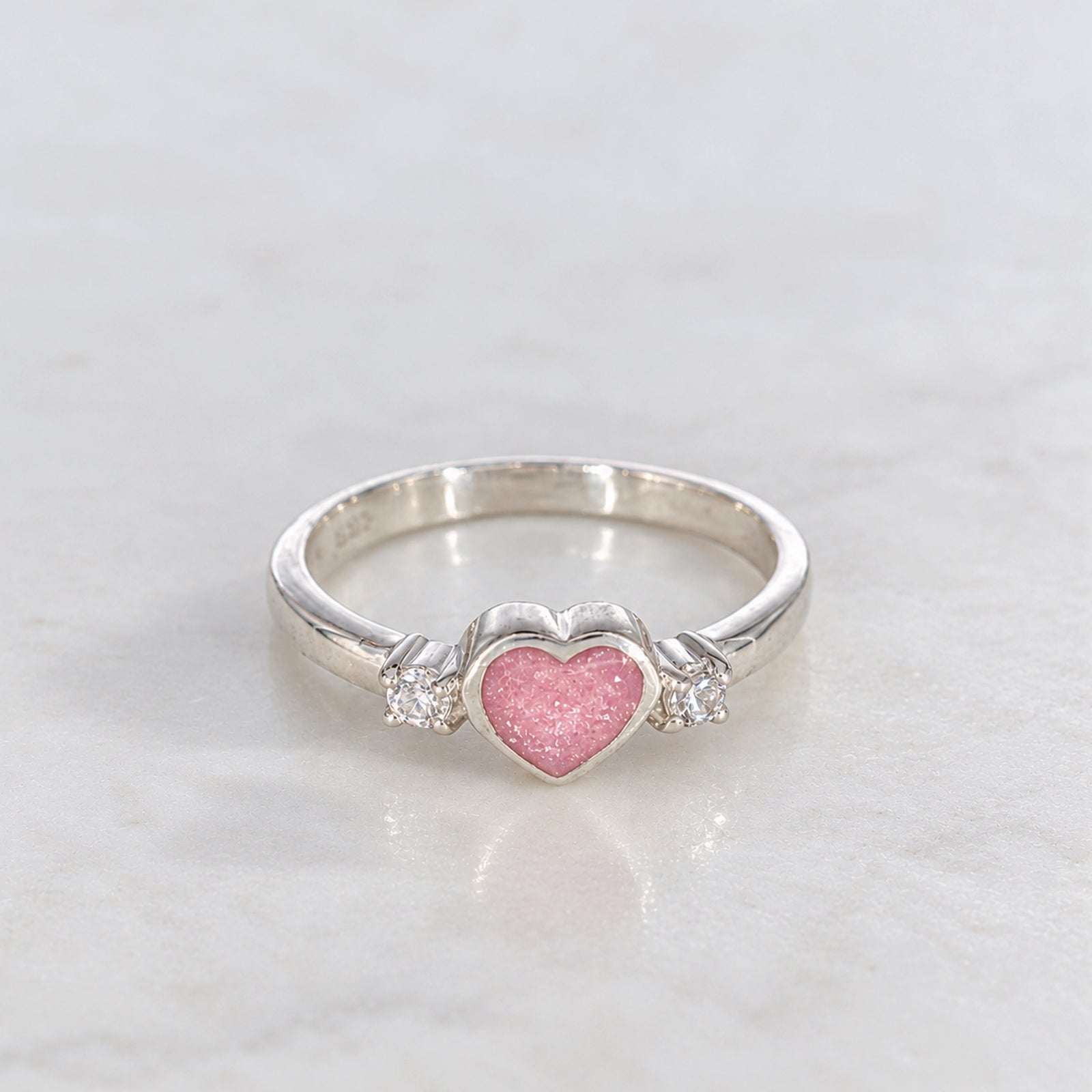 Sterling silver memorial ring for cremation ashes with heart and sparkling CZ stones