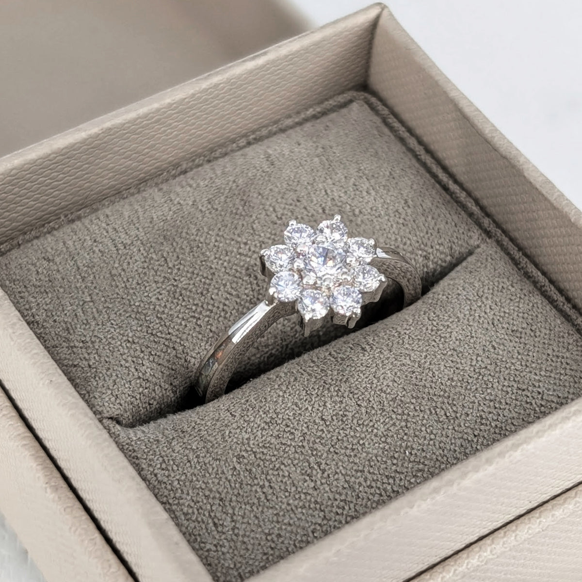 Sterling silver cremation ashes ring with sparkling cubic zirconia cluster