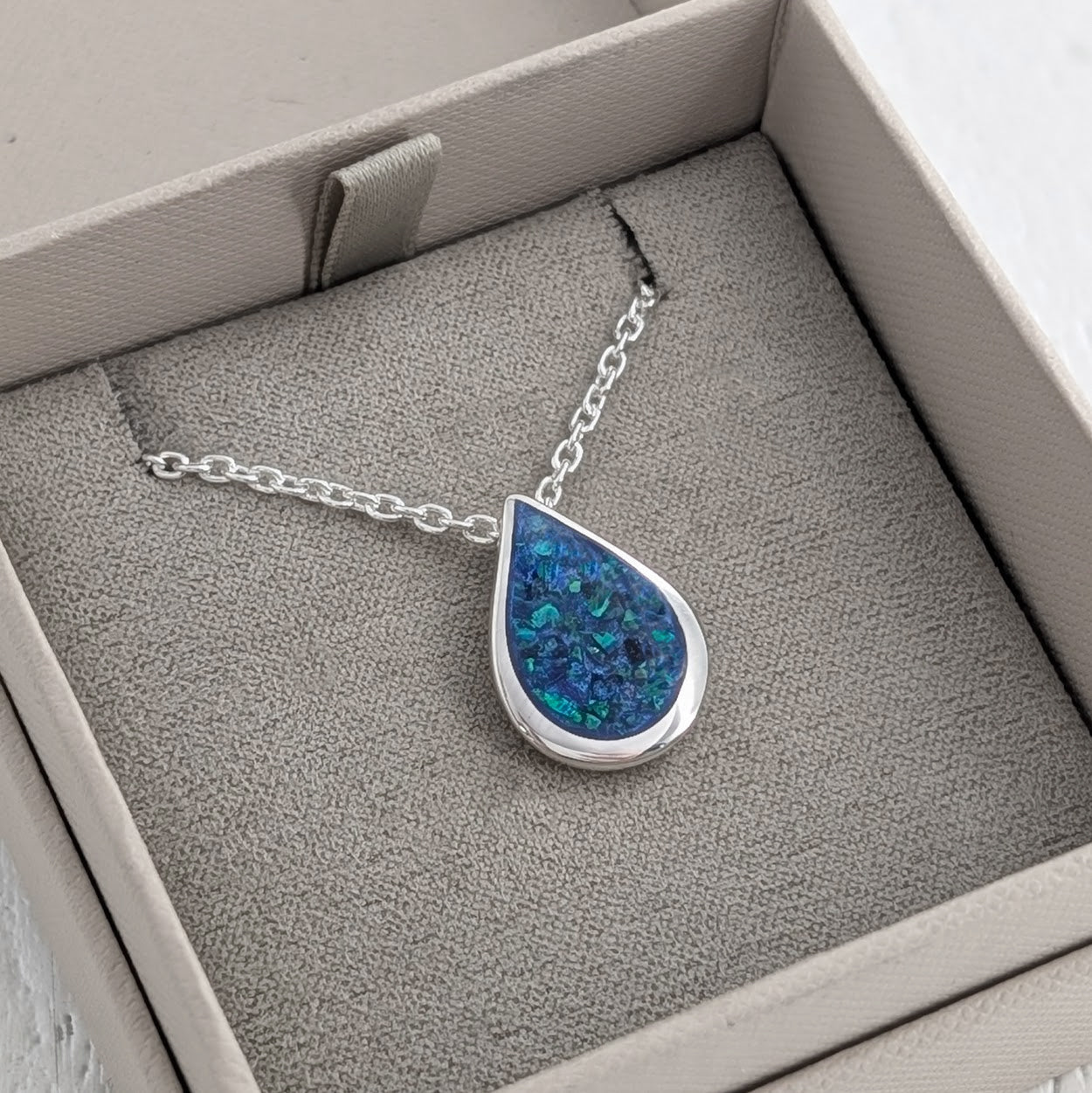 Memorial Teardrop Necklace - Handmade in sterling silver and set with cremation ashes behind an opal inlay