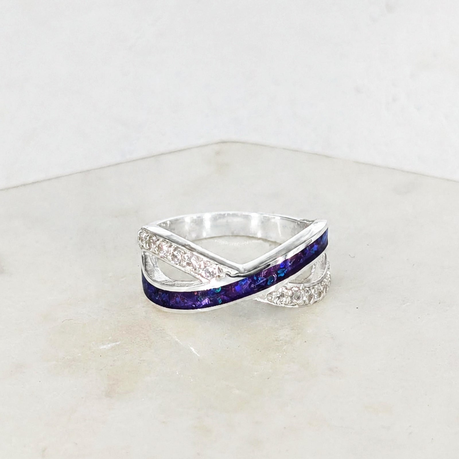 Sterling silver cremation ashes ring with cubic zirconia crossover design