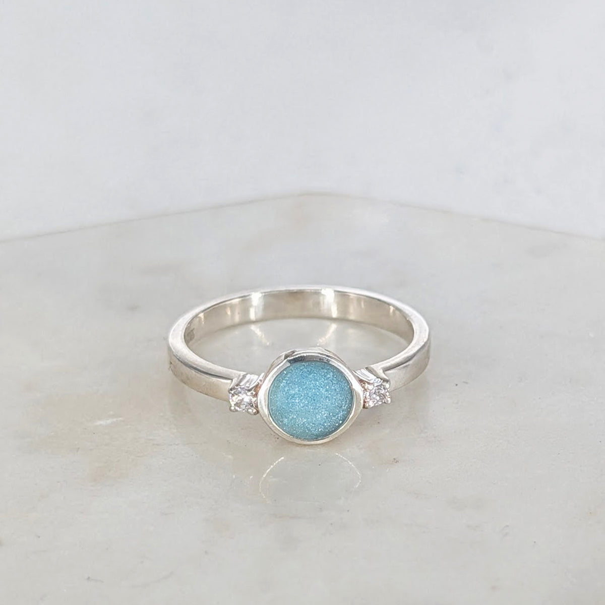 Turquoise memorial ashes ring in sterling silver with cubic zirconia detaili