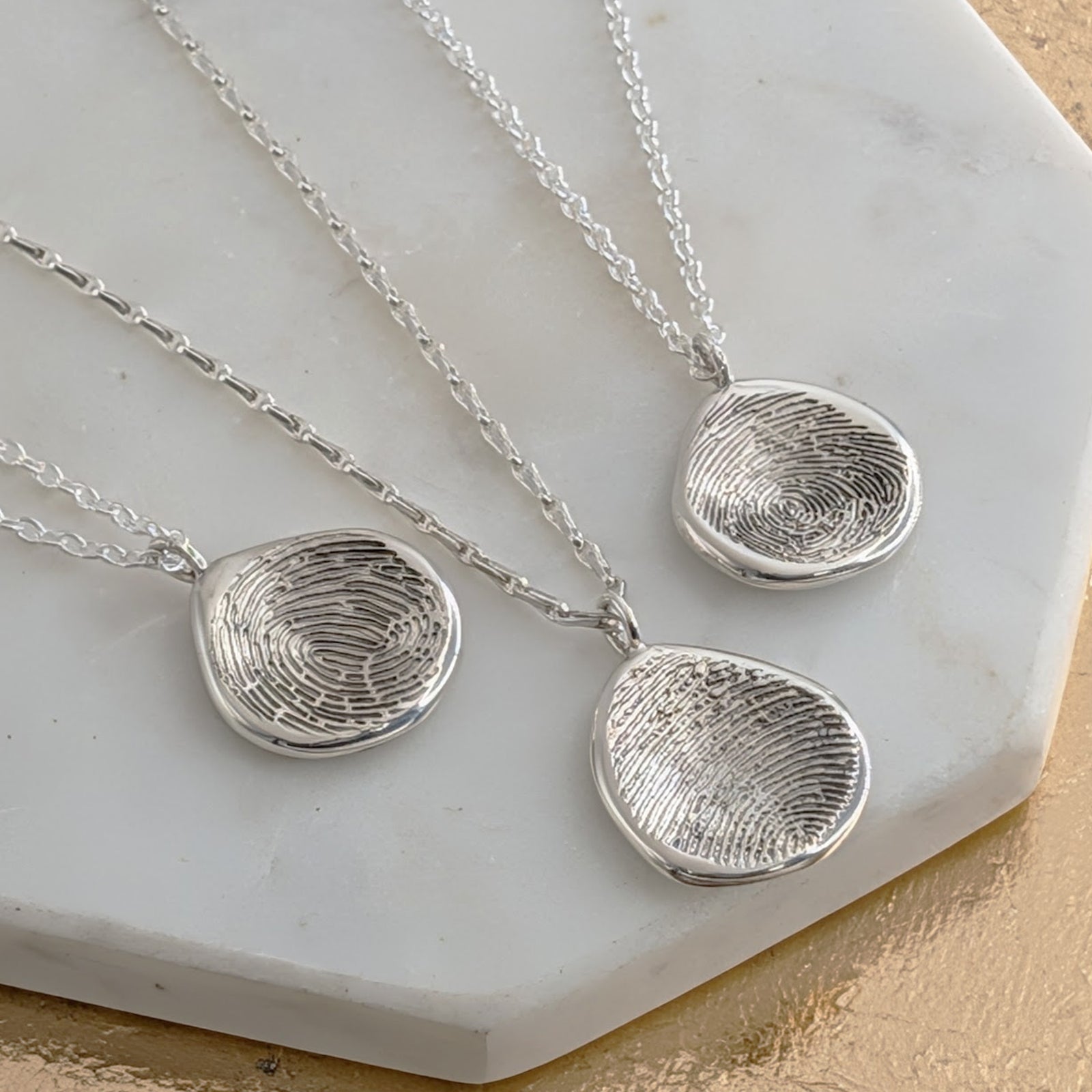 MOLTEN FINGERPRINT PENDANT