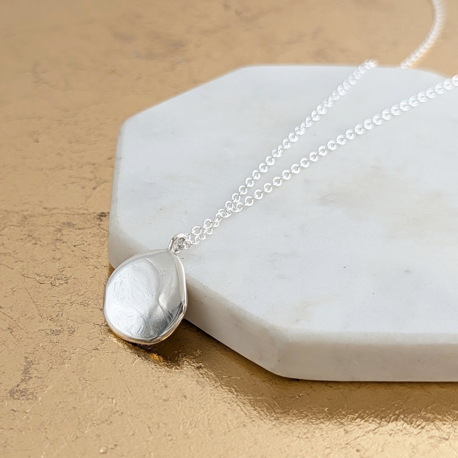 MOLTEN FINGERPRINT PENDANT