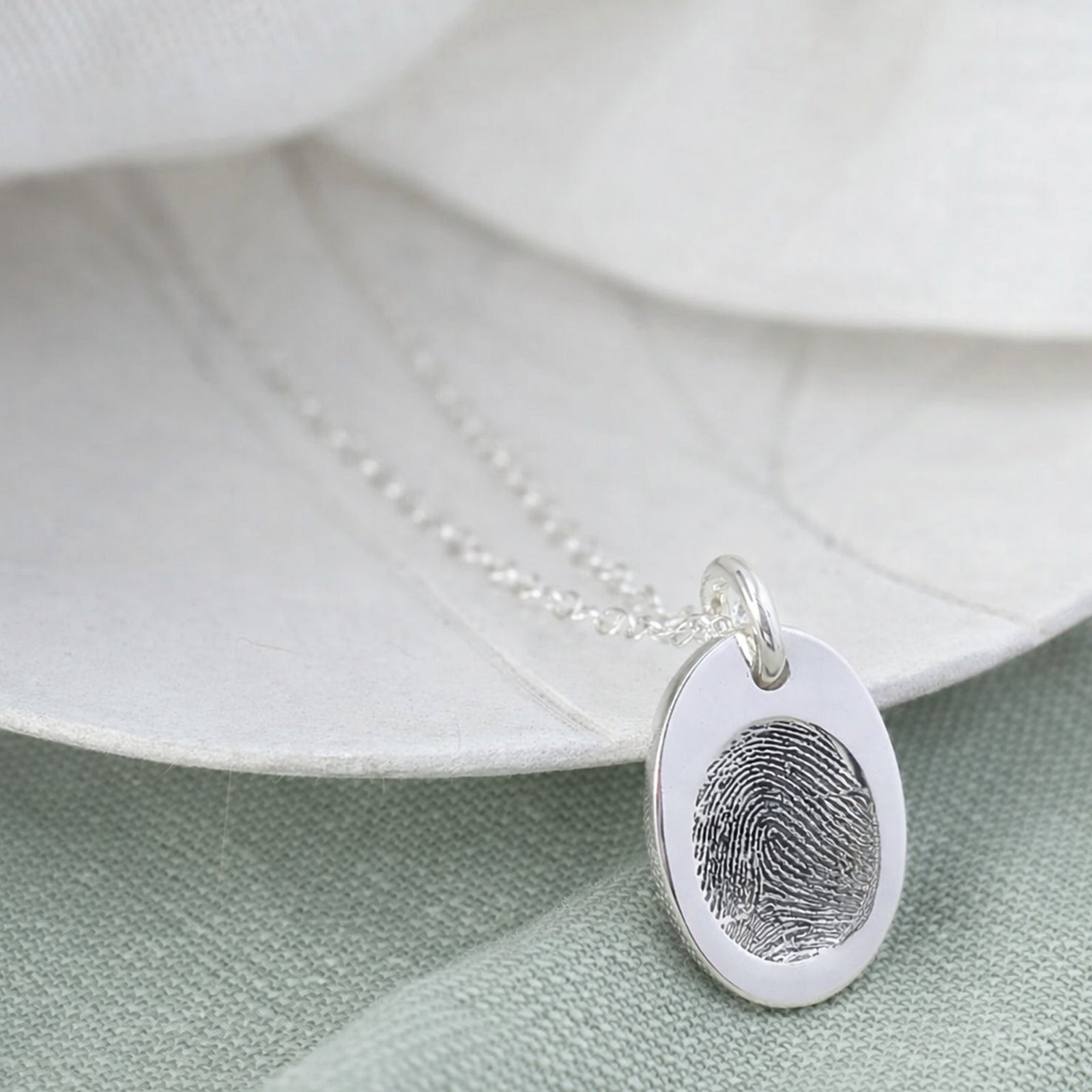 fingerprint impression oval charm in silver or solid gold
