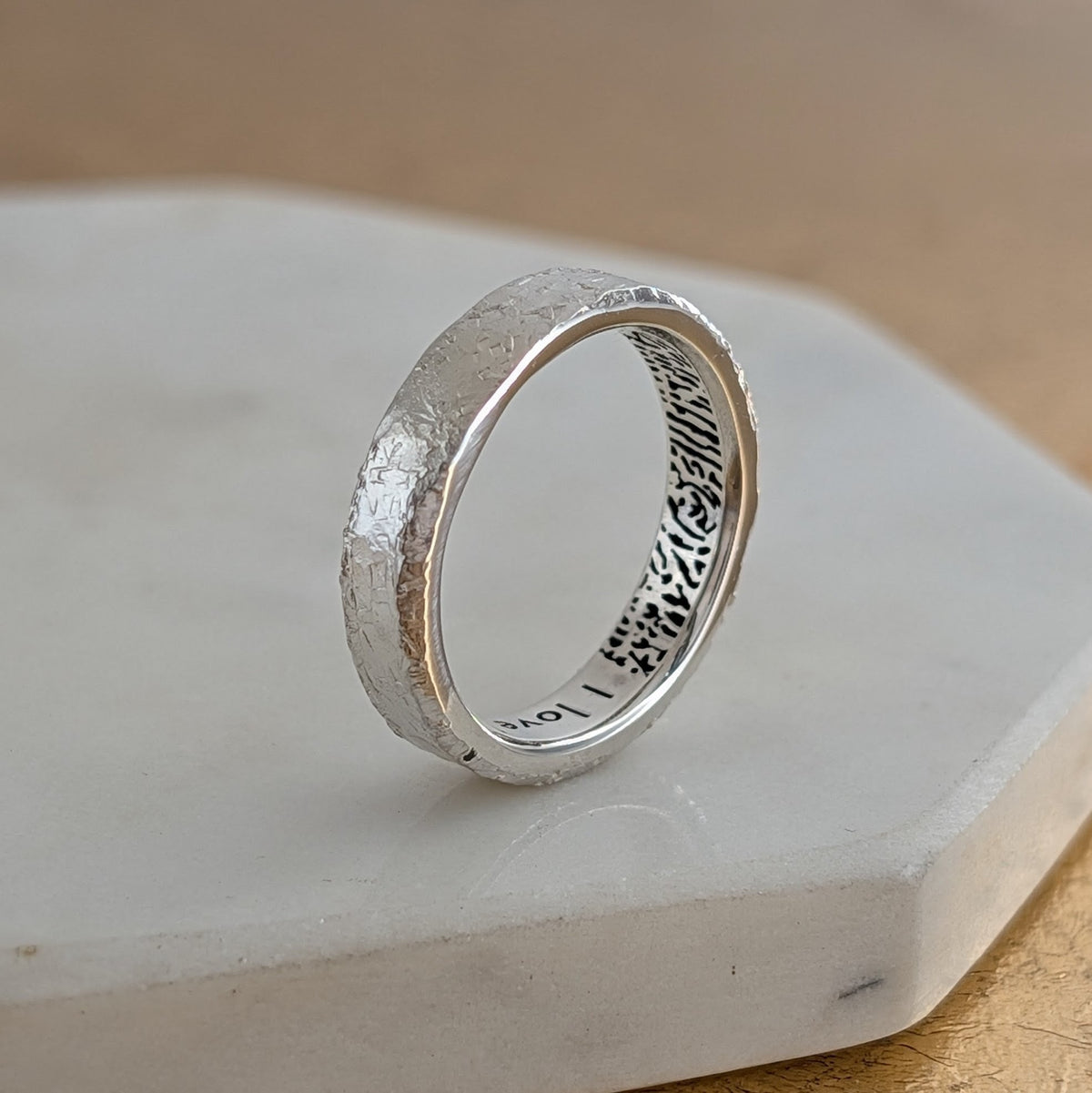 Silver hammered fingerprint ring