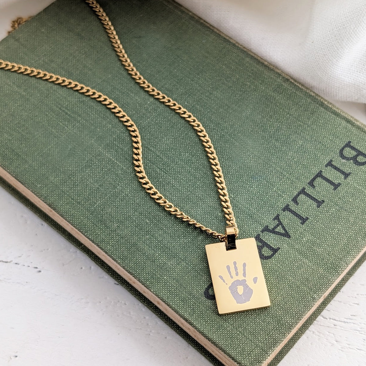 Gold stainless steel baby handprint necklace on chain