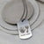 HAND & FOOTPRINT STEEL DOG TAG NECKLACE