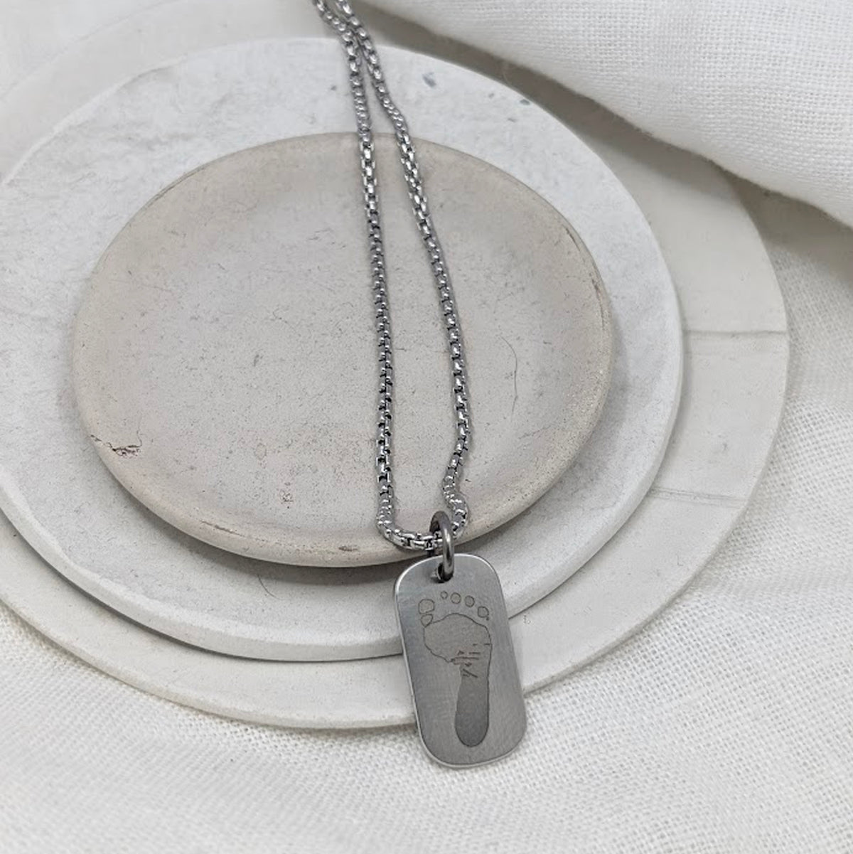 FOOTPRINT STEEL SMALL DOG TAG NECKLACE