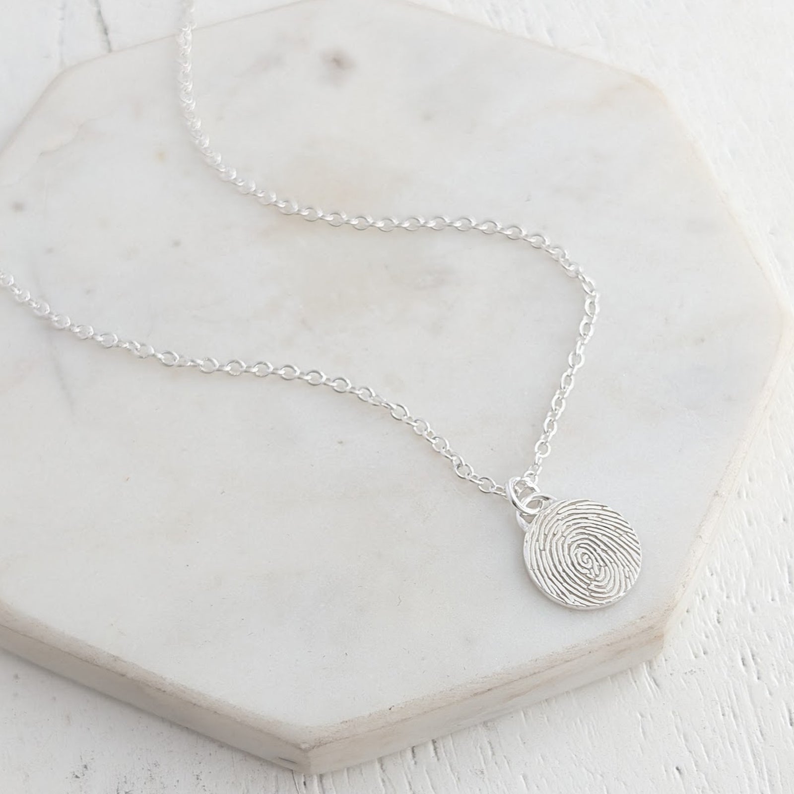 Sterling silver fingerprint disc charm necklace