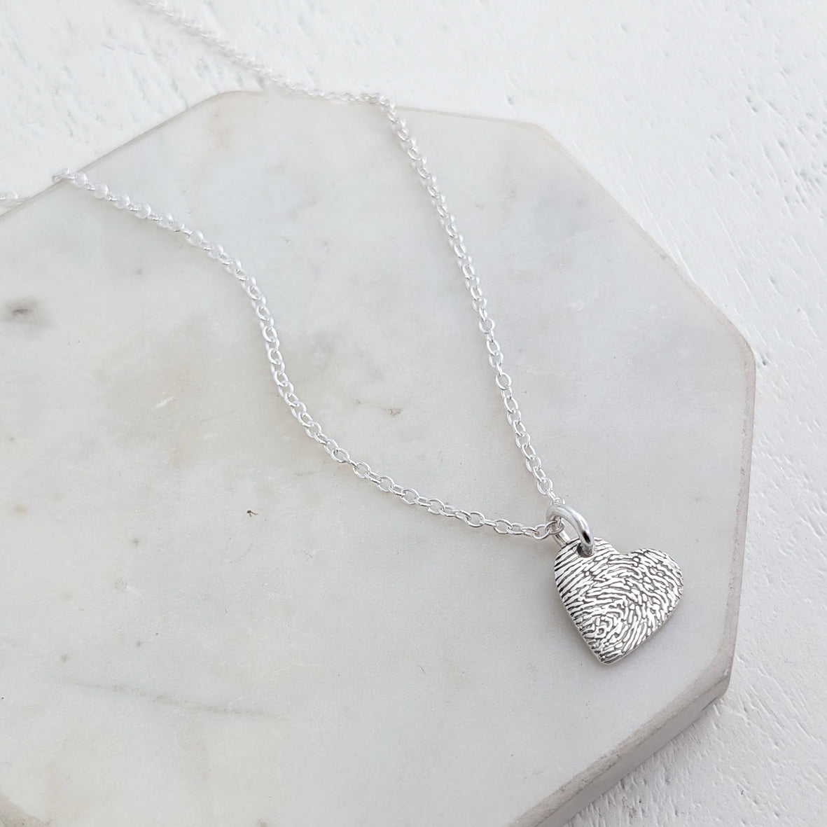 FINGERPRINT HEART CHARM