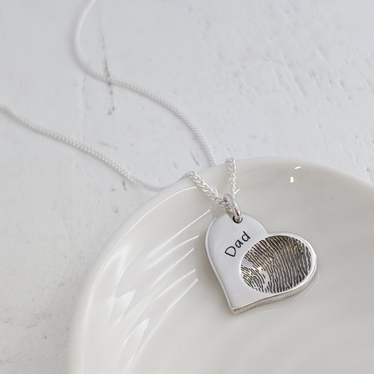 Fingerprint memorial jewellery - capture a loved one's fingerprint in silver or gold