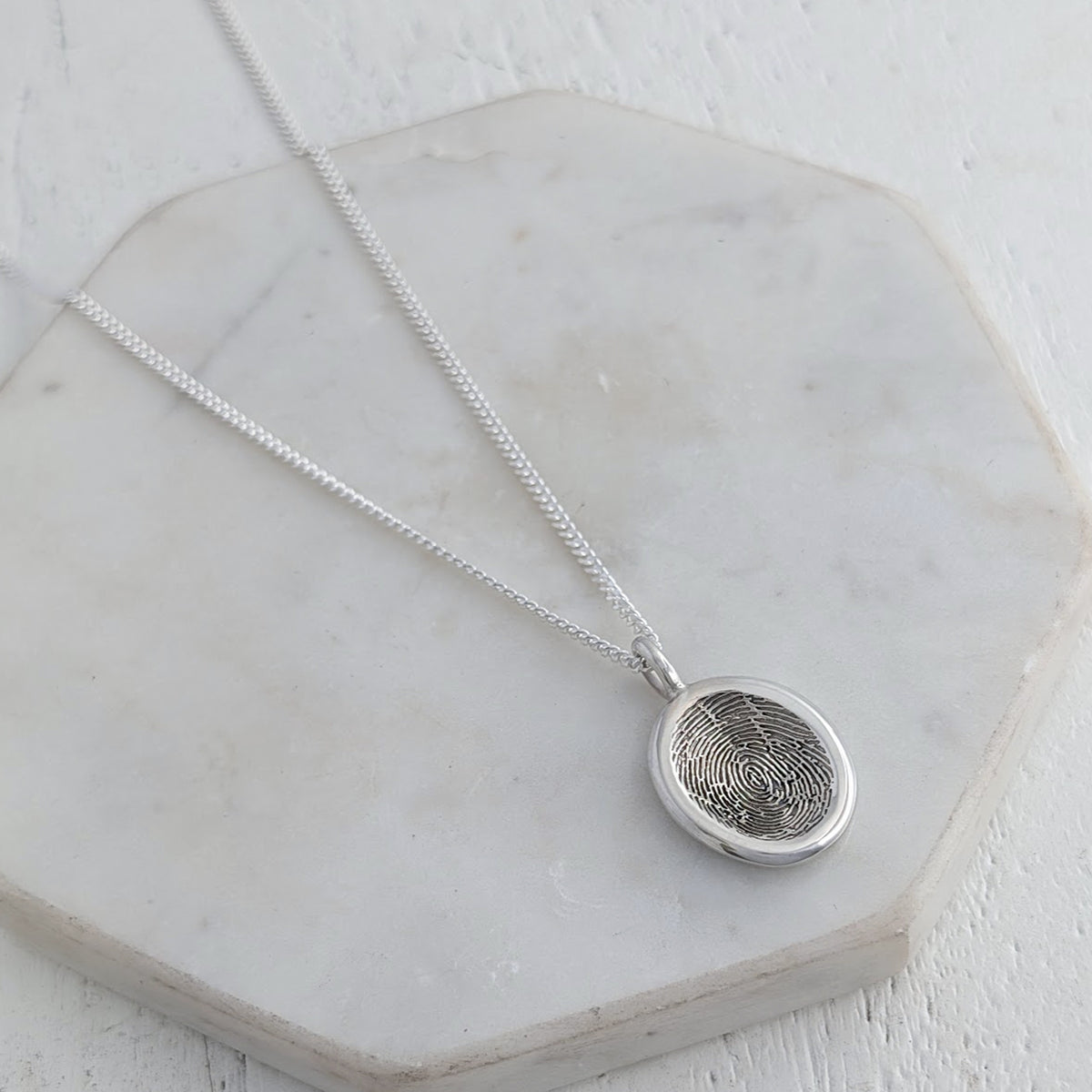 Handmade terling silver or gold organic pebble fingerprint necklace