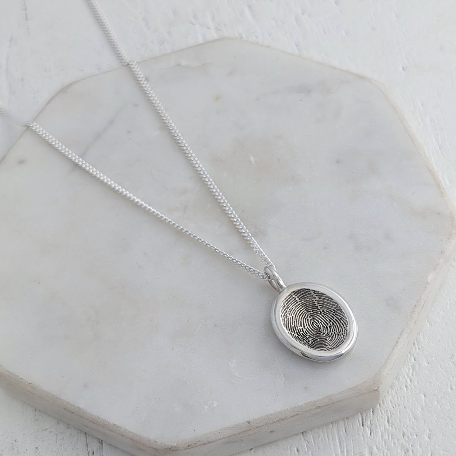 Handmade terling silver or gold organic pebble fingerprint necklace