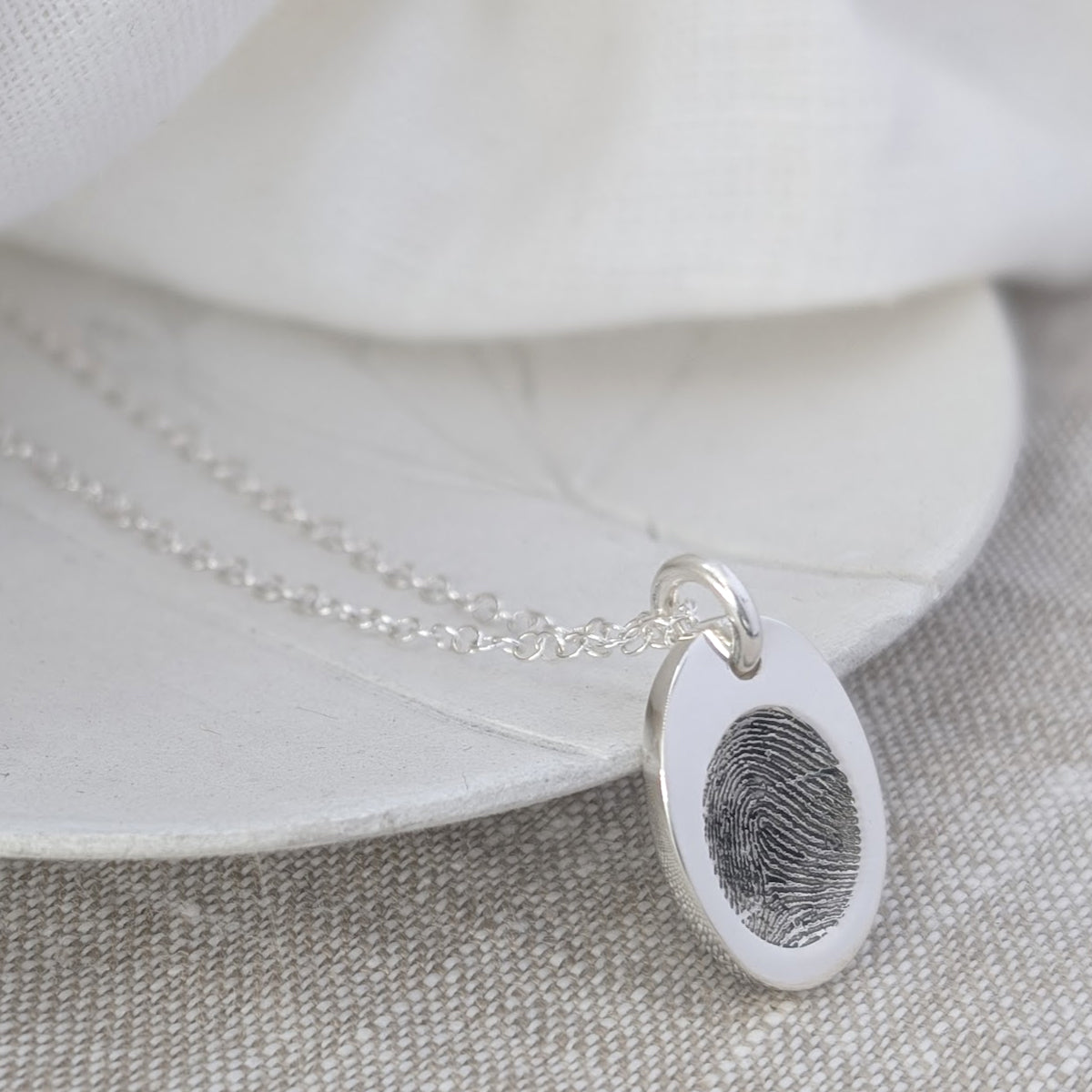 fingerprint impression oval charm in silver or solid gold