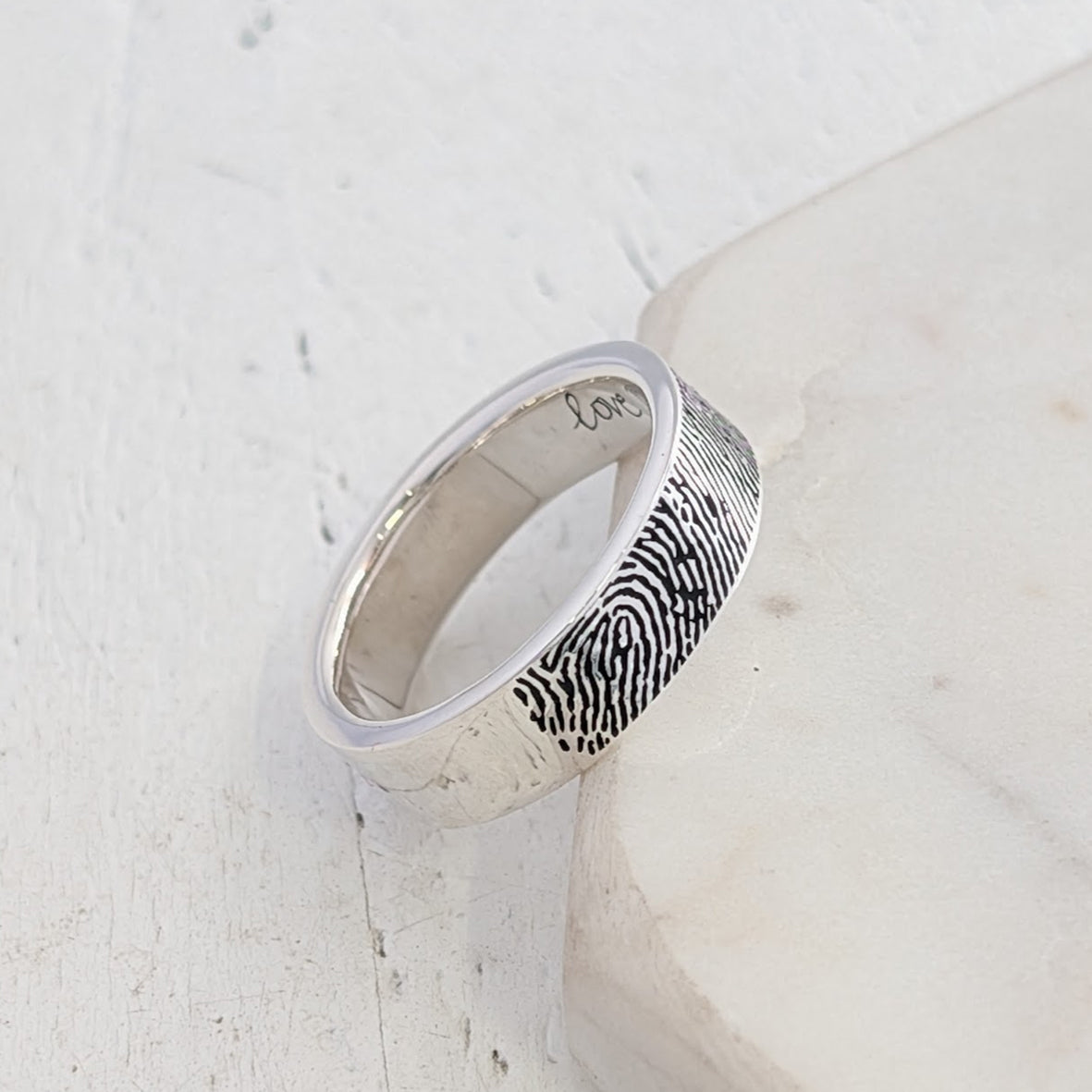 Sterling silver handmade wedding ring engraved with fingerprint and handwriting