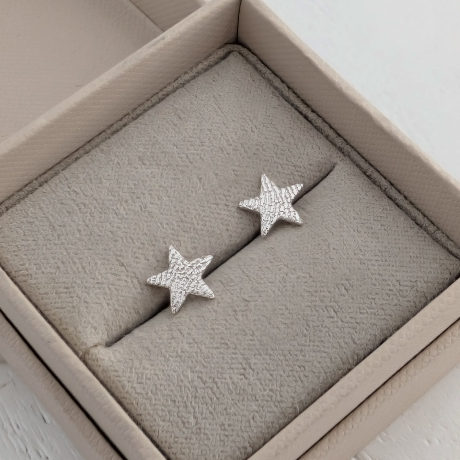 Fingerprint Star Stud Earrings in Silver or Gold – Delicate personalised star stud earrings engraved with a real fingerprint. Handmade in sterling silver or solid gold as a meaningful keepsake jewellery gift.
