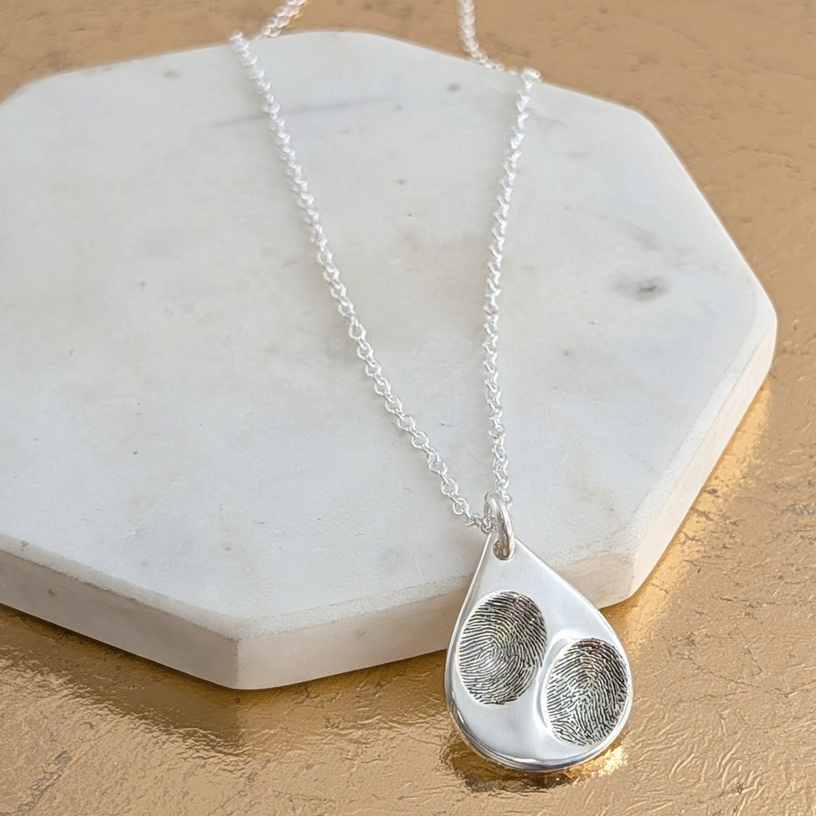 Double fingerprint dewdrop necklace handmade in sterling silver