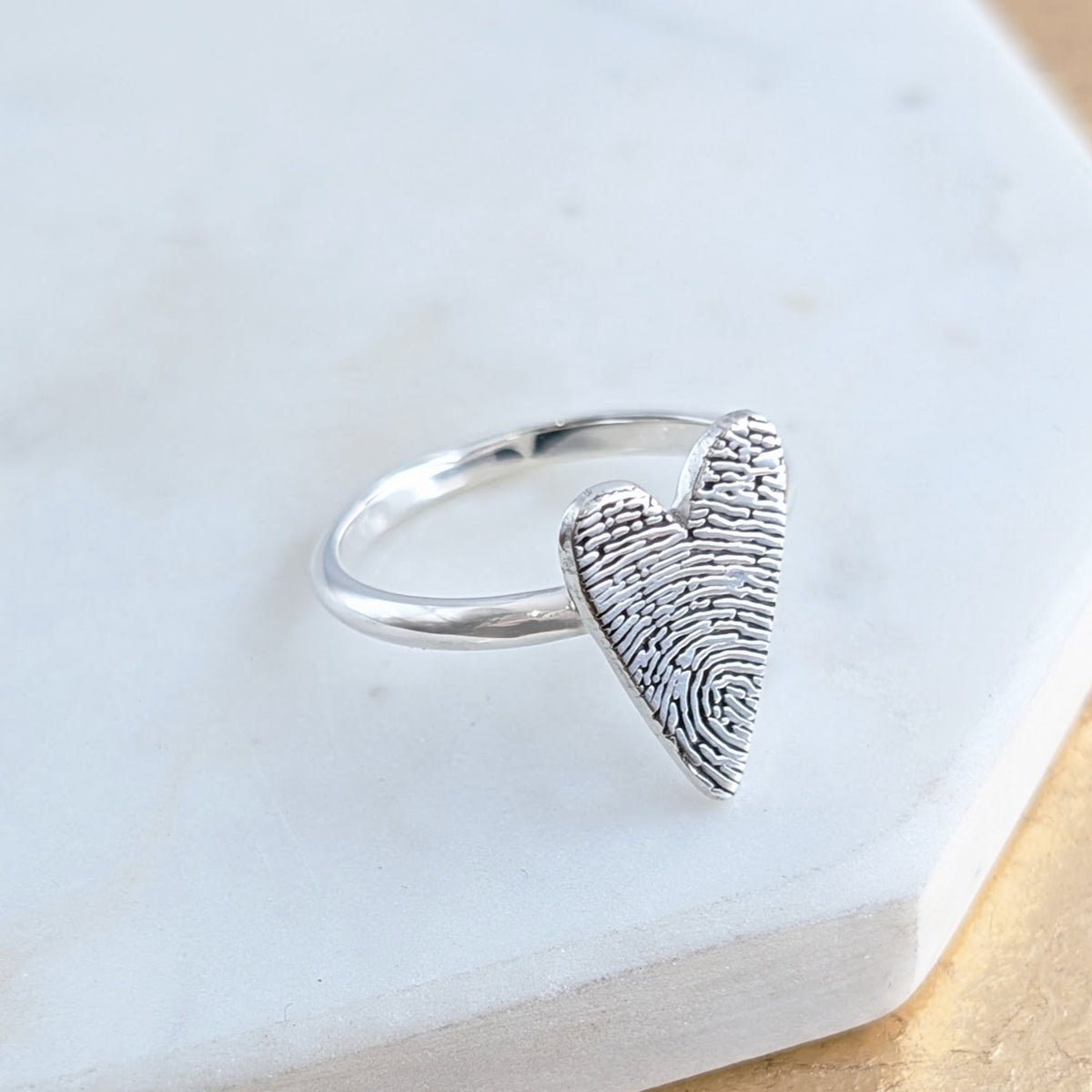 Silver fingerprint heart ring
