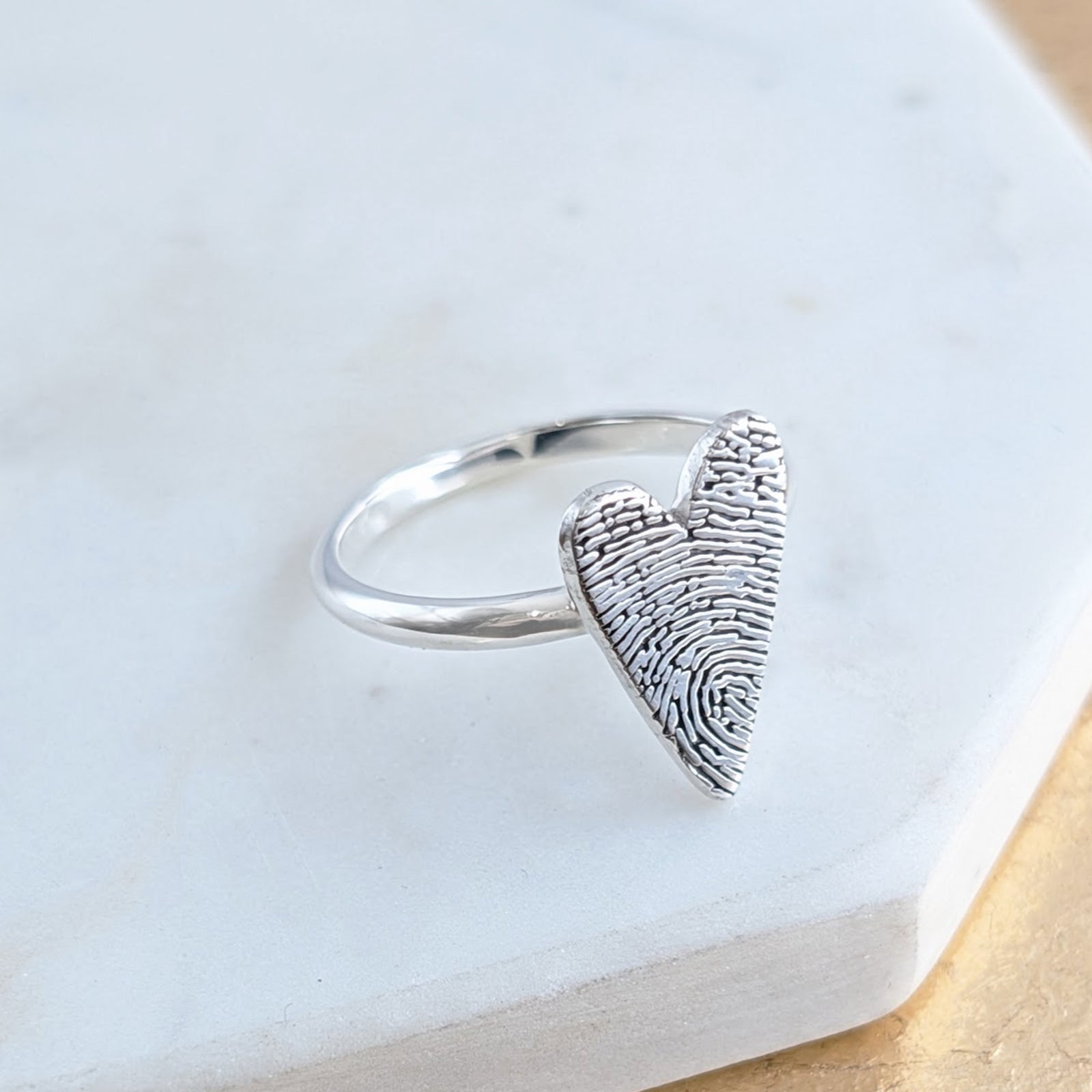 Silver fingerprint heart ring
