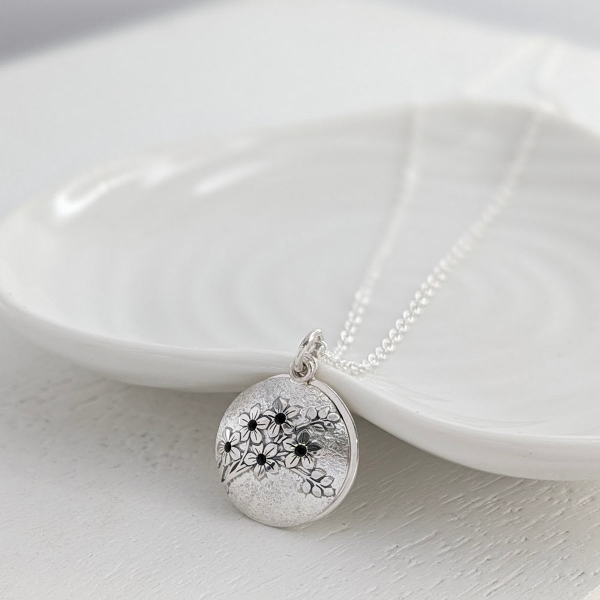 Handmade silver necklace engraved with forget-me-nots