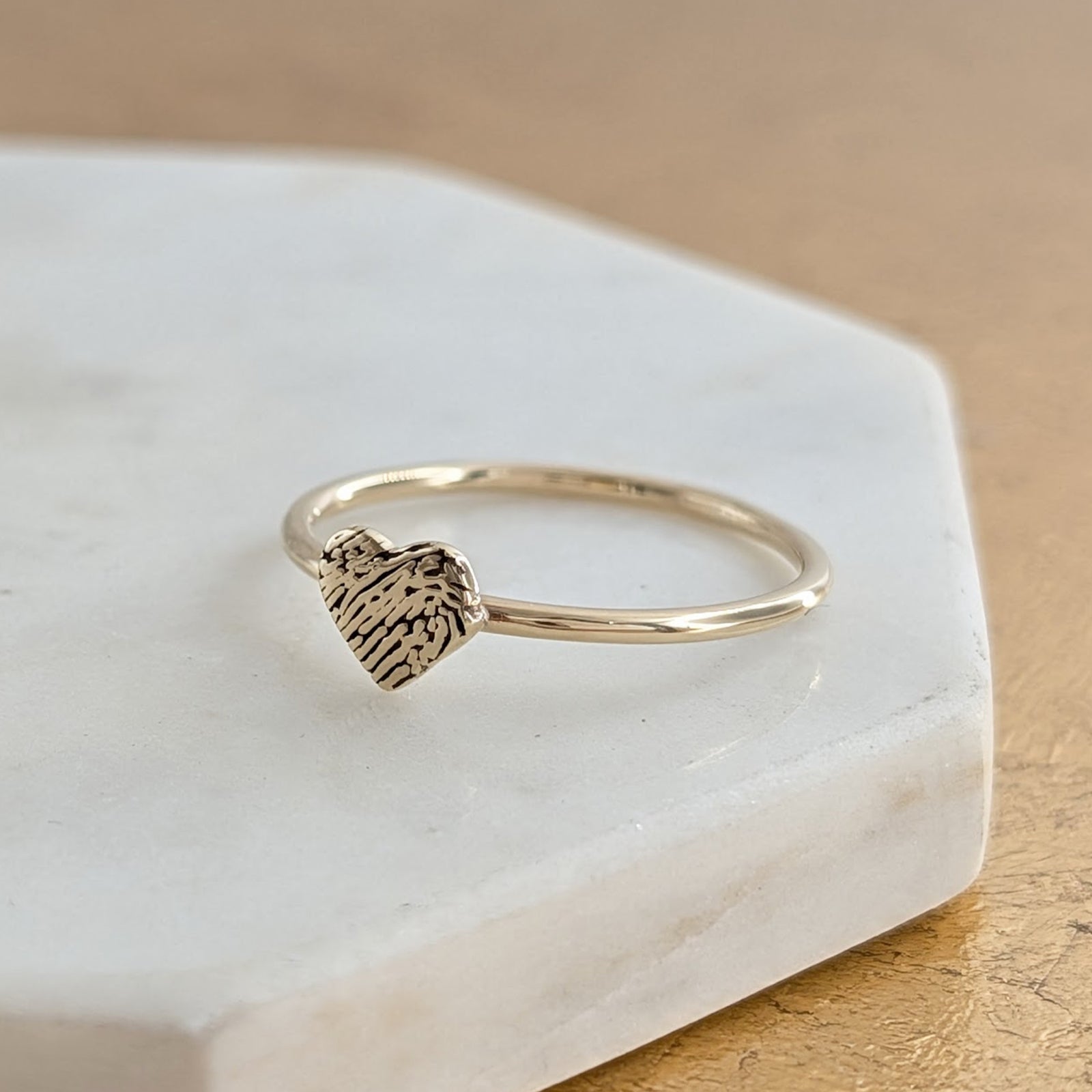 Solid gold fingerprint heart ring