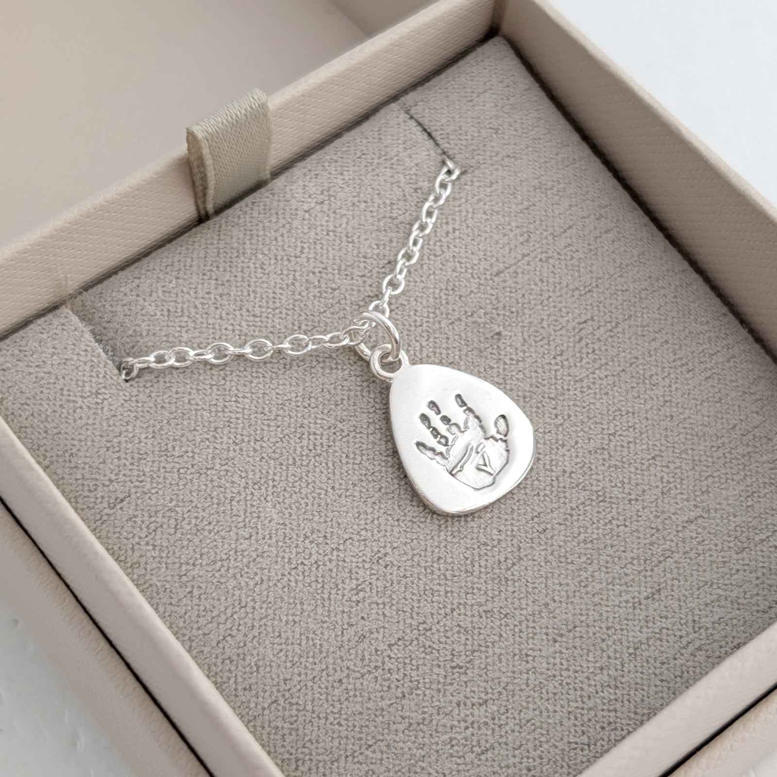 Gold or silver baby handprint and footprint charm necklace personalised with real newborn prints