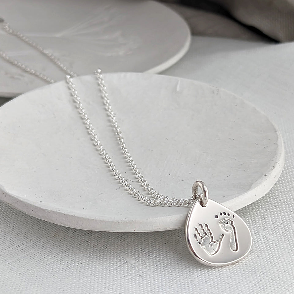 Baby handprint and footprint droplet necklace for mum in silver or gold