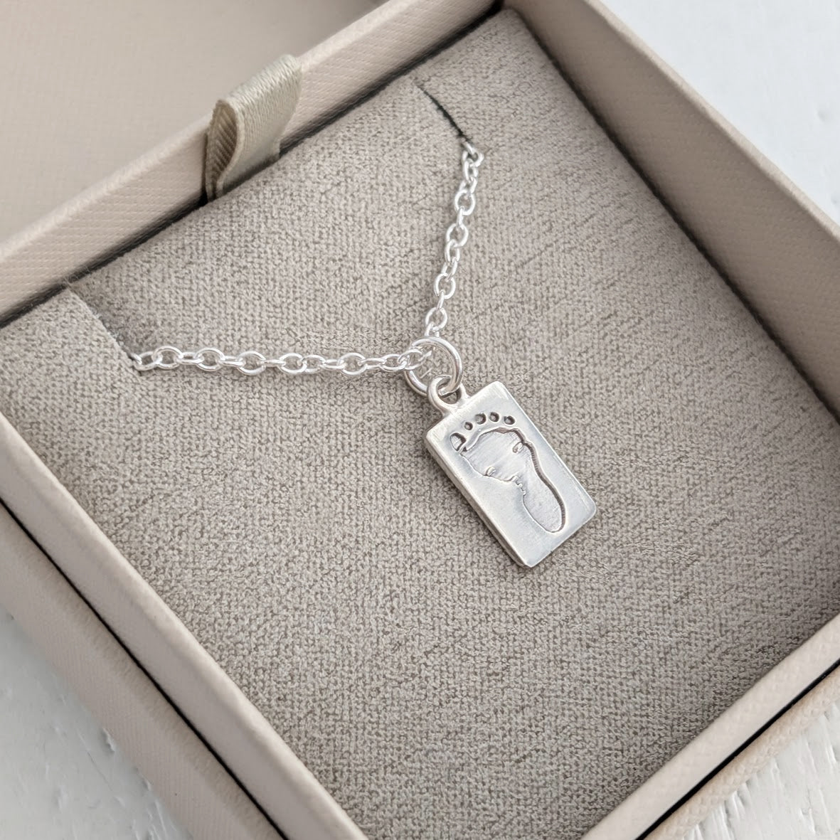 Silver Baby Handprint Footprint Tag Charm Necklace engraved with new baby prints