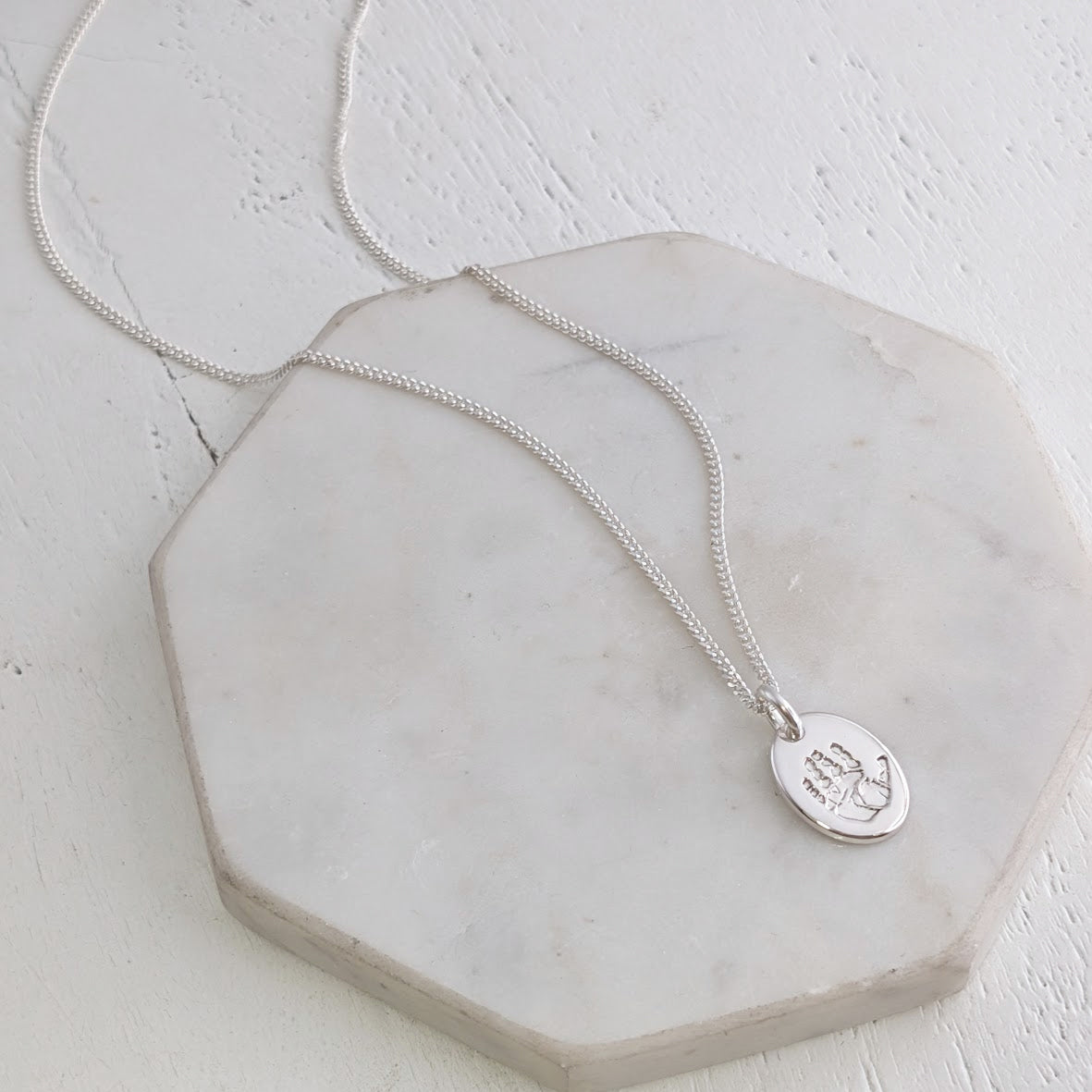 silver or gold baby engraved handprint charm neckace - handmade in the UK