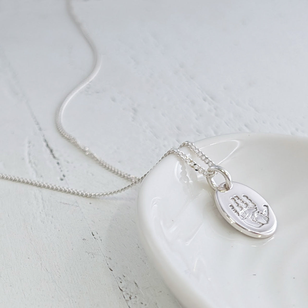 baby handprint or footprint silver keepsake jewellery