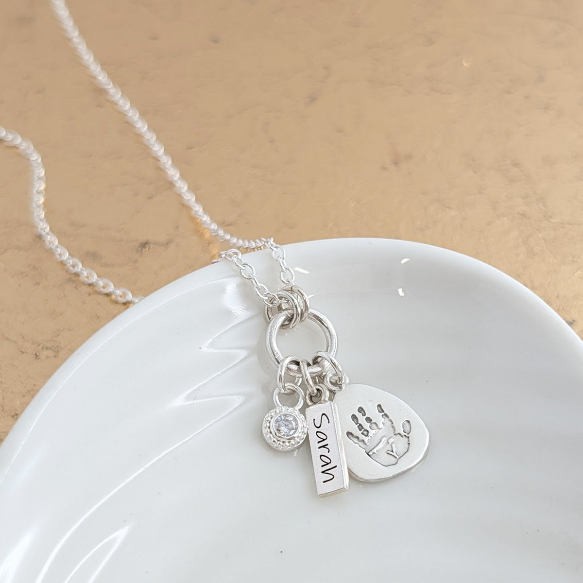 Sterling silver handprint or footprint droplet necklace with birthstone charm and little name tag