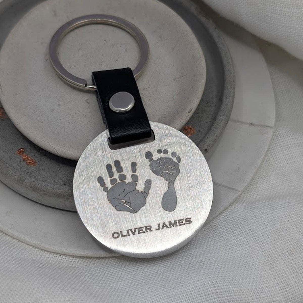 HAND &amp; FOOTPRINT STEEL DISC KEYRING