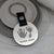 HAND & FOOTPRINT STEEL DISC KEYRING