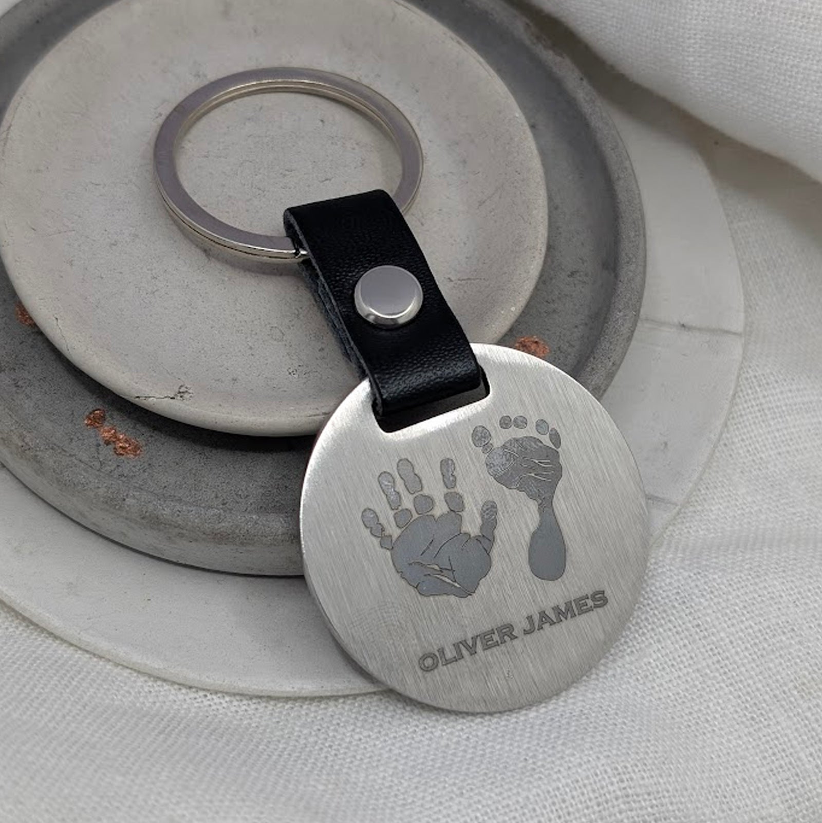 HAND & FOOTPRINT STEEL DISC KEYRING