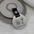 HAND & FOOTPRINT STEEL DISC KEYRING