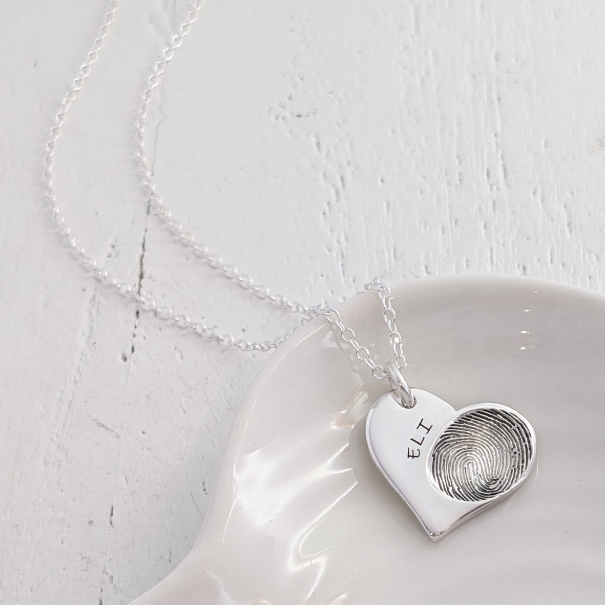 Fingerprint memorial jewellery - capture a loved one's fingerprint in silver or gold