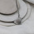 HANDPRINT STEEL HEART NECKLACE