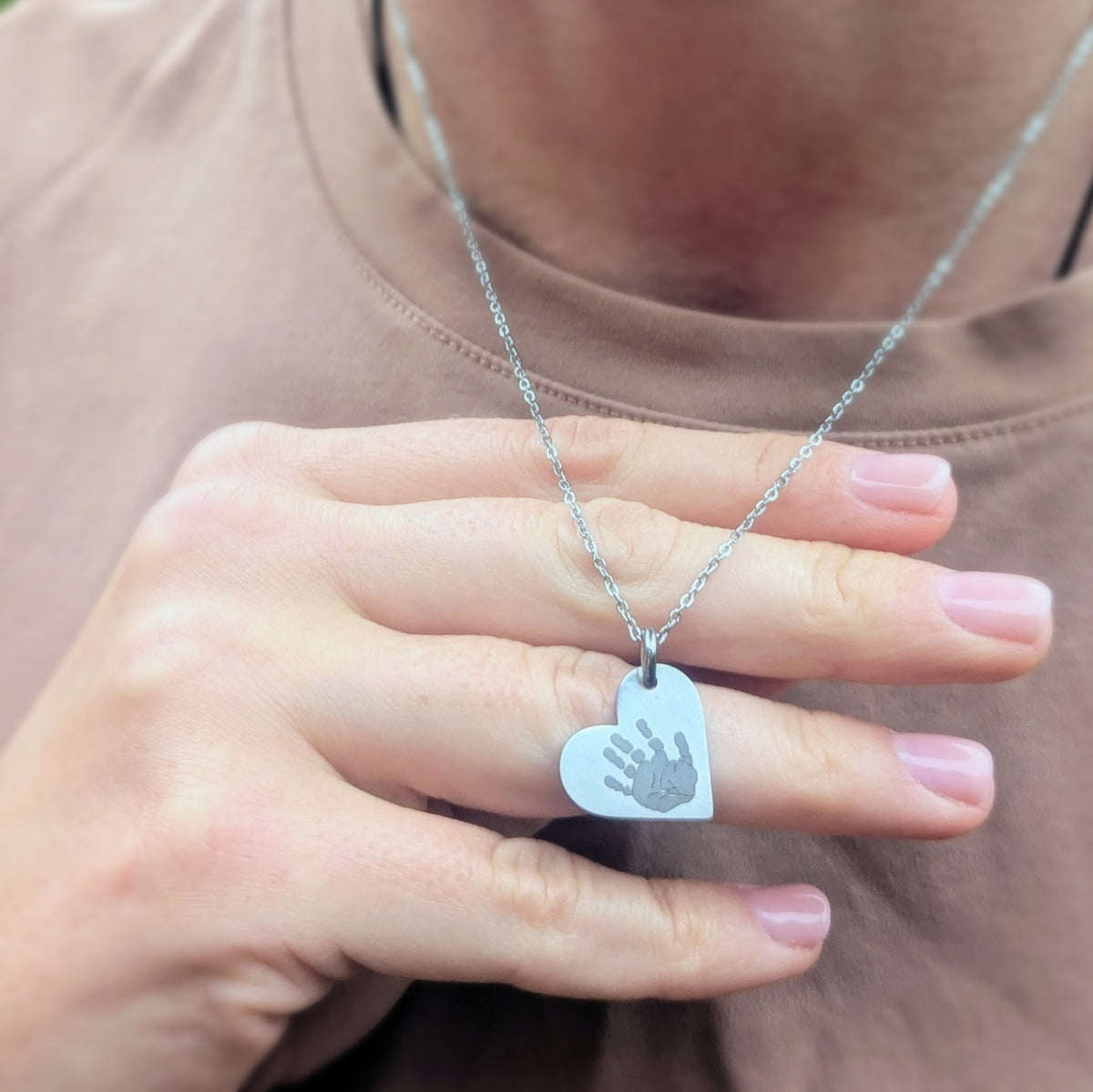 HANDPRINT STEEL HEART NECKLACE